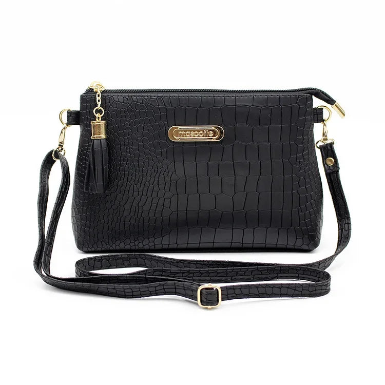 Women's Textured Crossbody Bag with Tassel Strap