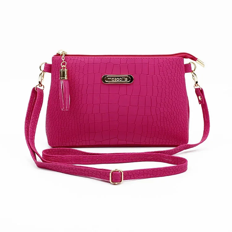 Women's Textured Crossbody Bag with Tassel Strap