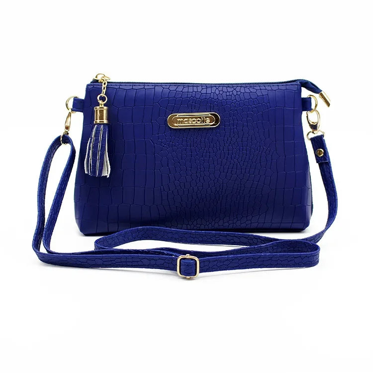 Women's Textured Crossbody Bag with Tassel Strap