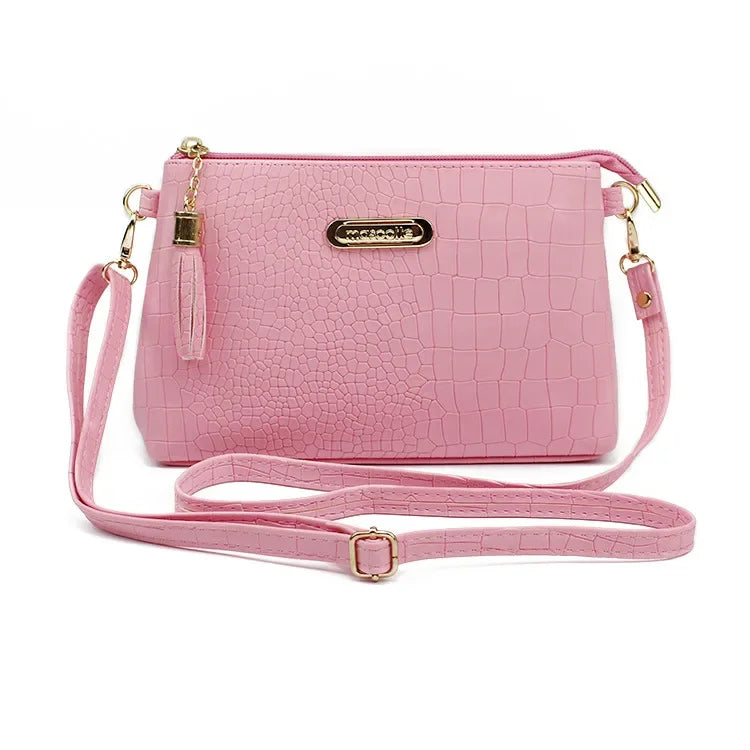 Women's Textured Crossbody Bag with Tassel Strap